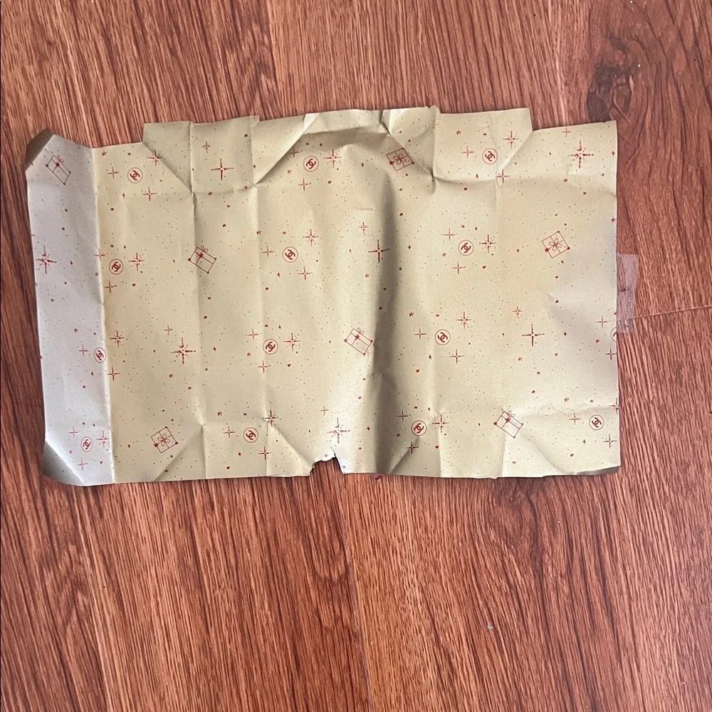 CHANEL Red Gift Wrap with Festive Patterns